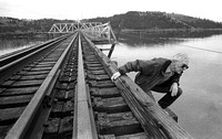 Former bridge tender Tom Agte checks the old structure of the swing-span bridge over Lake Chatcolet and the lower St. Joe River