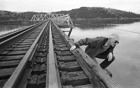 Former bridge tender Tom Agte checks the old structure of the swing-span bridge over Lake Chatcolet and the lower St. Joe River