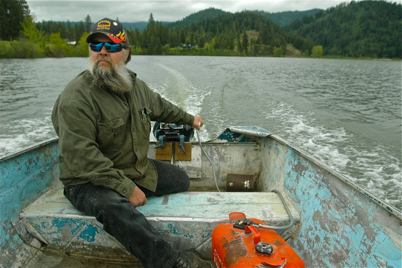 Cut off from the mainland by flood water of the Coeur d'Alene River, Medimont resident Jed Rodgers resorts to another mode of transportation, 2008